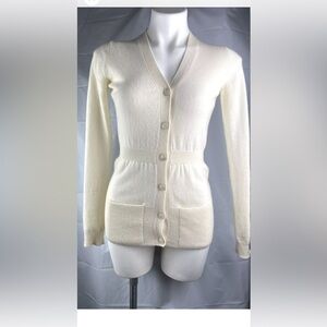 Theory women 100% cashmere Sweater cardigan cream color size P or size 0